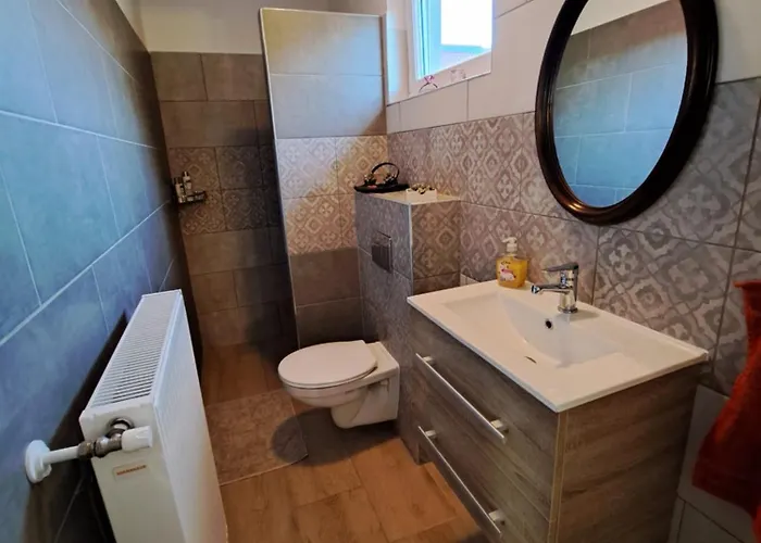 Apartament De Bloementuin / A Viragoskert *